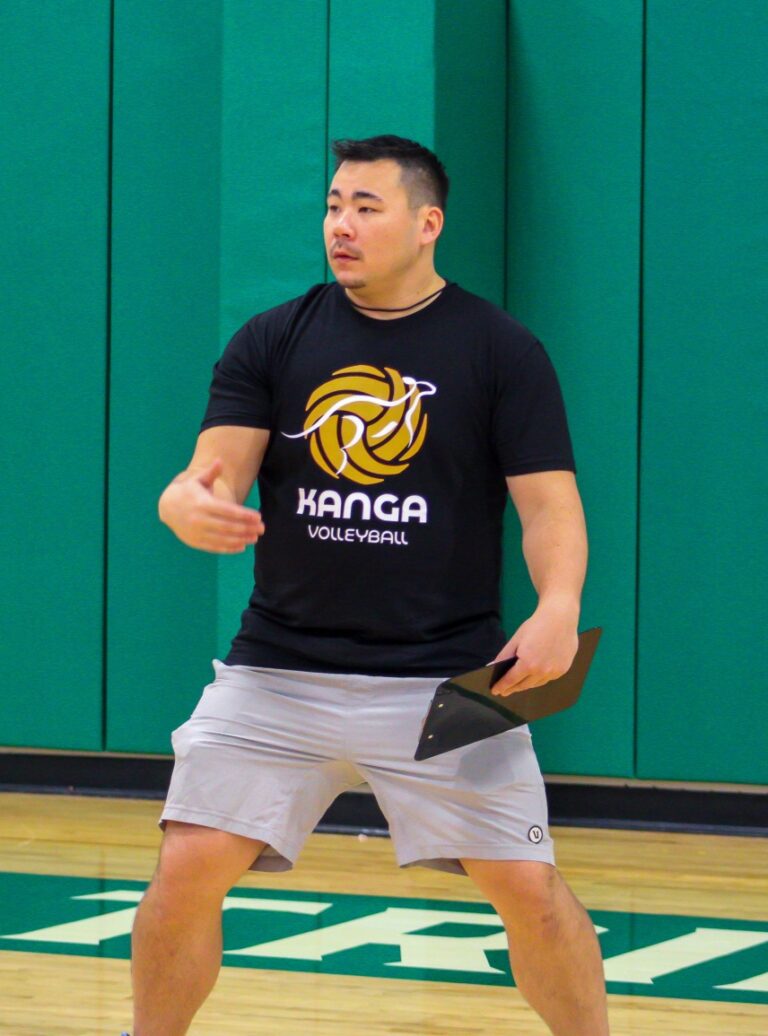 a guy coaching volleyball